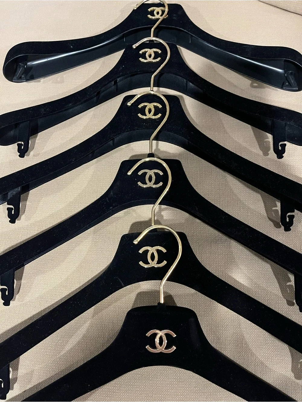 CHANEL Lot of Six Black Flocked Dress/Jacket Hangers with Gold-tone CC Logo